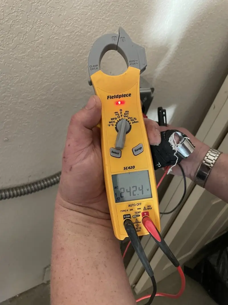 Voltage testing with clamp meter during Generator Installation in Steamboat Springs